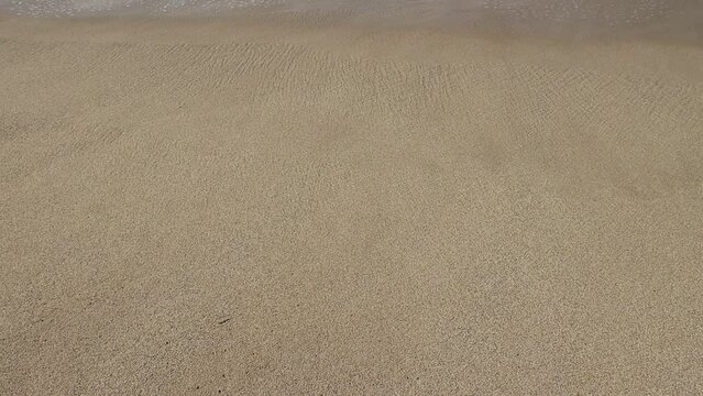 sand ripples on the beach. Waves Crashing On Beach slow motion video