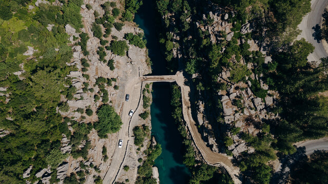 Ancient arch bridge over the Koprucay river gorge in Koprulu national Park in Turkey.