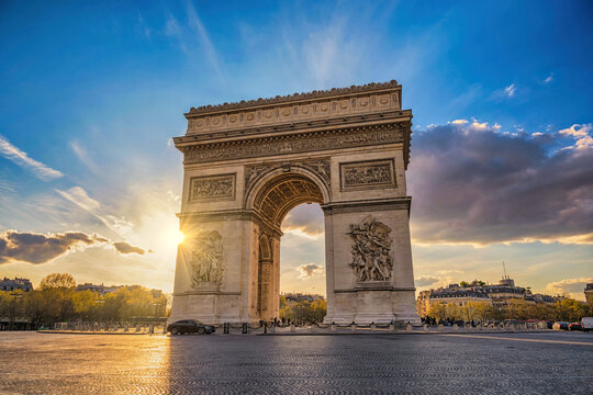Paris France sunset city skyline at Arc de Triomphe and Champs Elysees