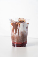 iced chocolate with milk and strawberry syrup