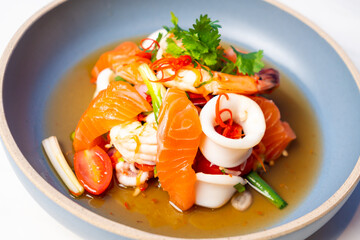 salmon and seafood spicy salad