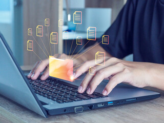 Businessman handling online document database files (DMS), searching and managing database files with automated processes. orderliness of documents within the organization