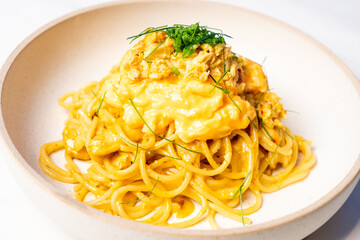 spaghetti with spicy crab curry in Thai style