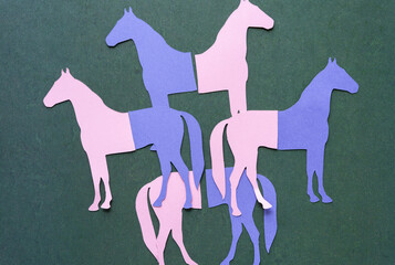 surrealism inspired composition with cutout glyphs in the shapes of horses and re-arranged so that...