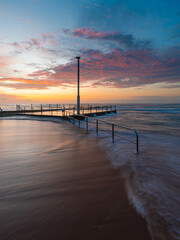 Beautiful sunrise view of Mona Vale rock pool, Sydney, Australia.