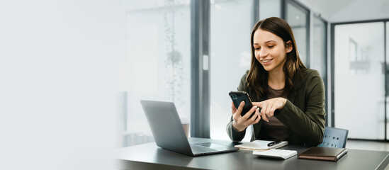 Attractive caucasian business woman top manager working with laptop tablet cojmputer planning financial strategy analyst and global stock market and sector indices trading data.