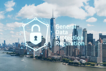 Aerial panoramic helicopter city view of Lower Manhattan and Downtown financial district, New York, USA. GDPR hologram, concept of data protection regulation and privacy for all individuals