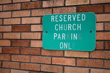 Fototapeta na wymiar reserved parking for church goers