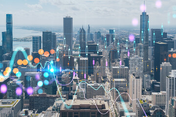 Aerial panorama city, Chicago downtown area and Lake, day time, Illinois, USA. Birds eye view. Forex graph hologram. The concept of internet trading, brokerage and fundamental analysis