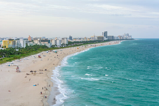 Miami beach coastline on the sunset sky