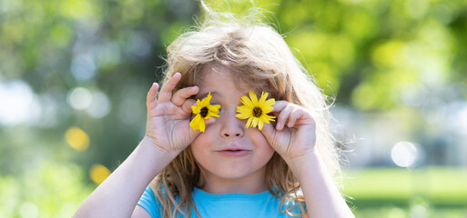 Close up face of cute child outdoors. Spring banner for website header. Spring kids portrait, funny...