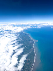Naklejka na ściany i meble The coastal line at Tasman sea side: view from an airplane window