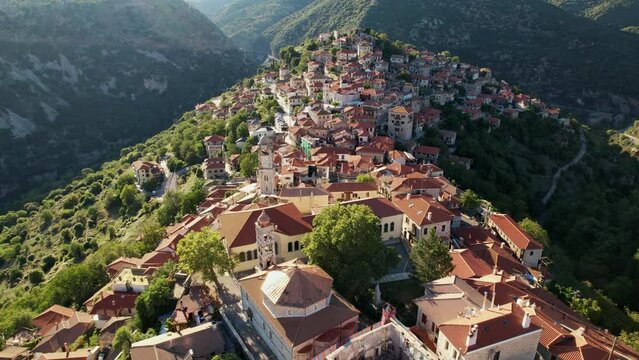 Aerial video by drone of the historical village Dimitsana with the traditional houses and the famous clock tower in Arcadia, Peloponnese, Greece