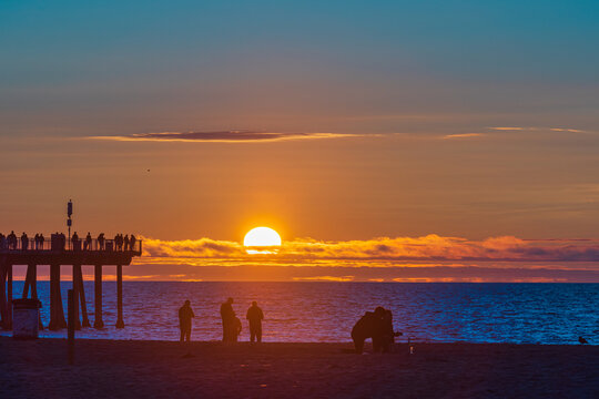 California Hermosa Beach .
We can see beautiful sunset at Hermosa Beach California. The western sky and horizon are glowing with the setting sun.
