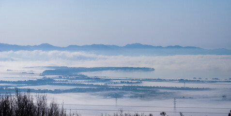 Temperature inversion forms cloudsea in snowy town and lake (Inawashiro, Fukushima, Japan)