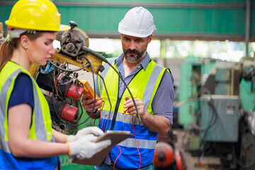 Service and maintenance concept. Service manager male engineer explain the procedure for using the...