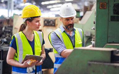 Training trainee concept. Hispanic latin male engineer explain the procedure for using the correct...