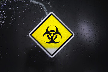 Quarantine. Quarantine warning sign on a glass door in a hospital isolator. Isolation of patients...