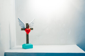 stand cross with a heart. home decoration