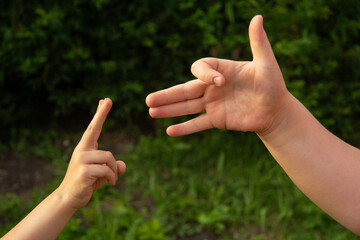 children's hands in the summer depict a dog and a hare. Theatre