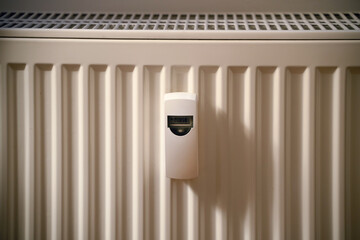 Electronic Heat Cost Allocator. Measuring the amount of heat used in the apartment. Energy crisis concept