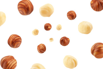 Falling Hazelnut peeled, isolated on white background, selective focus