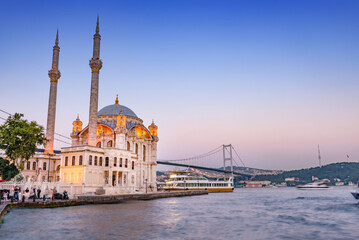 Fototapeta na wymiar Beautiful evening panorama of Ortakoy Mosque, the Bosporus Straight, Istanbul, Turkey