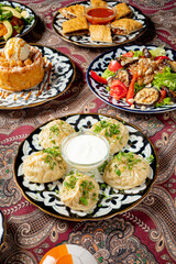  The concept of oriental cuisine. Uzbek food manty dumplings. Uzbek food.