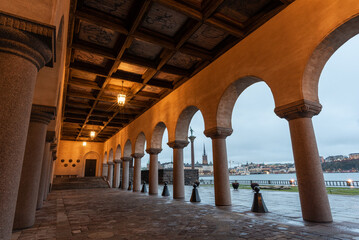Stockholm City Hall (Stockholms stadshus) inside yard view with cityscape on evening