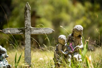 cemetery graves and cross in a graveyard in australia