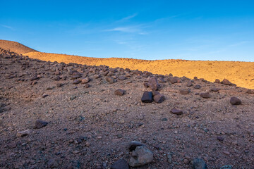 Crossing rocky mountains of the Morocco deseert. 