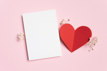 Blank Valentines Day greeting card mockup with red heart
