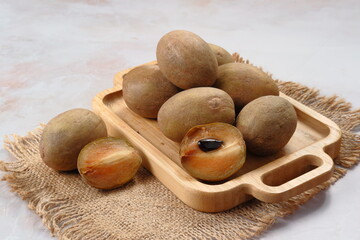 Buah sawo or Manilkara zapota, commonly known as sapodilla, sapota, chikoo, chico, naseberry, or nispero 