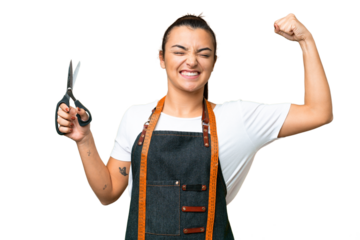 Seamstress woman over isolated chroma key background doing strong gesture