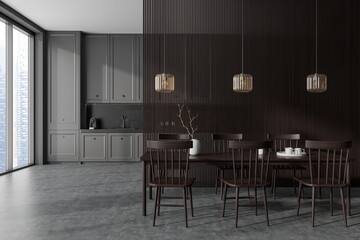 Front view on dark kitchen room interior with dining table
