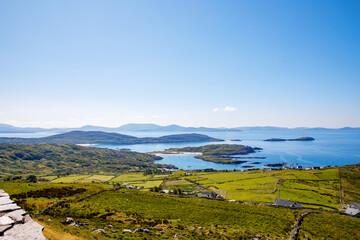 Fototapeta na wymiar Landscape of beach, hills and atlantic ocean of beautiful Ring of Kerry, Ireland. Travel destination for many tourists