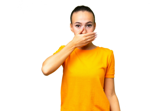 Young Arab woman over isolated background covering mouth with hand