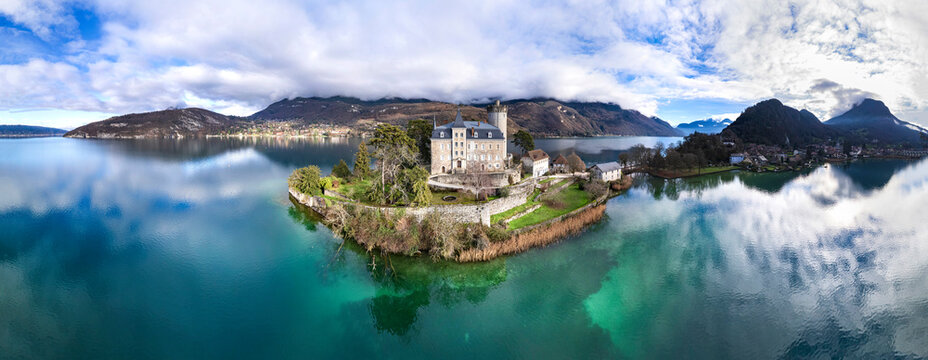 Amazing scenic lakes of European Alps - beautiful Annecy with fairytale castle Duingt. aerial panoramic view. France travel
