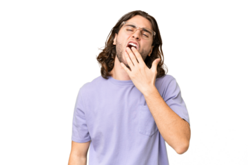 Young handsome man over isolated background yawning and covering wide open mouth with hand
