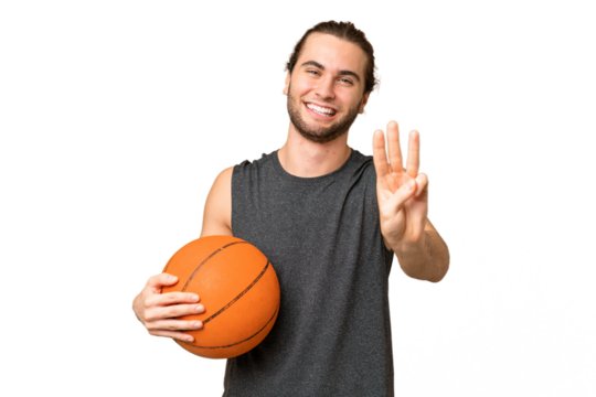 Young basketball player man over isolated background happy and counting three with fingers