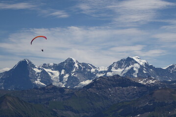 View from the Niesen Mountain on a paraglider over the Eiger, Monk & Virgin near Thun in Switzerland