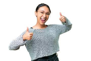Young Uruguayan woman over isolated chroma key background giving a thumbs up gesture