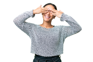 Young Uruguayan woman over isolated chroma key background covering eyes by hands and smiling