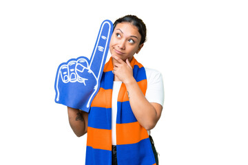 sports fan woman over isolated chroma key background looking up while smiling