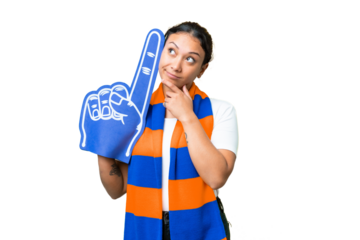 sports fan woman over isolated chroma key background looking up while smiling