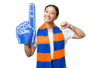 sports fan woman over isolated chroma key background proud and self-satisfied