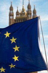 European flag with the British Houses of Parliament, the seat of the UK government in Westminster,...