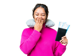 Young Uruguayan woman holding a passport over isolated chroma key background happy and smiling covering mouth with hand