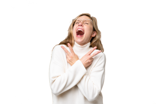 Young blonde woman over isolated background smiling and showing victory sign