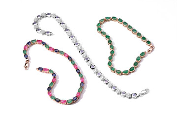 Elegant jewelry set. Jewellery set with gemstones. Jewelry accessories collage. Product still life concept. Ring, necklace and earrings.